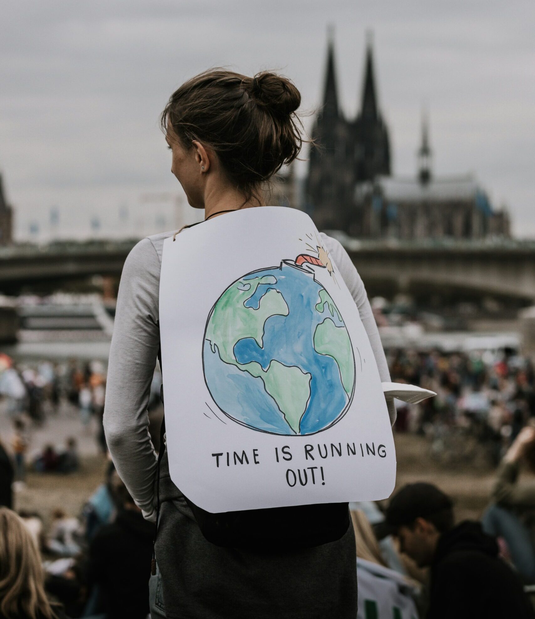 Group planting trees at sunrise—time to protect our planet